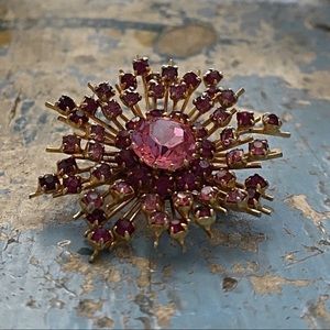 Vintage pink rhinestone starburst brooch made in Austria 1940s